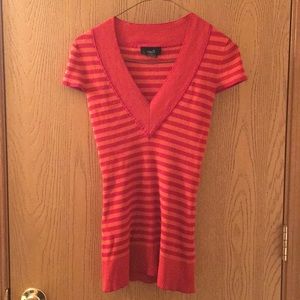 Orange shirt with red stripes